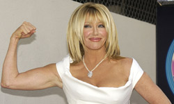 Suzanne Somers shows off her famously toned physique as she's honored with a star on the Hollywood Walk of Fame.­