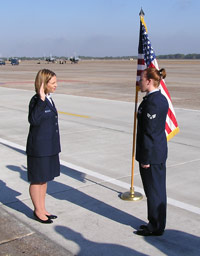 Audra Goldfuss performs a reenlistment ceremony.