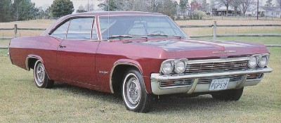 The 1965 Chevrolet Impala SS and other full-size cars got rounded bodysides, a higher beltline, and an aggressive rear-quarter bulge that year.