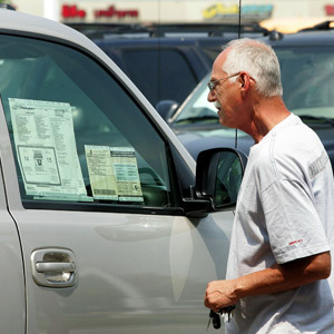 A man shopping for a new truck.