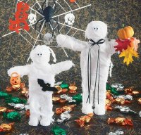 Use clothespins and cheesecloth to create these funny Junior and his Mummy Halloween decorations.