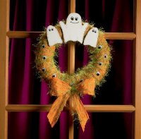 This lighthearted Halloween wreath welcomes trick-or-treaters.