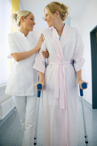 woman and nurse in hospital