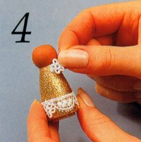 For step 4, glue the flat lace to the peg doll body.