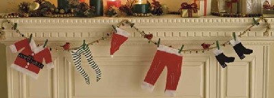 Santa Hangs It Up Christmas garland.