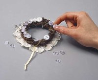 Arrange buttons around wreath.