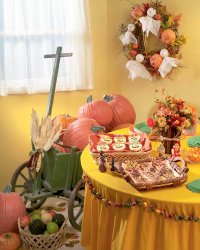 Create a beautiful hearth with fall decorations for this historical Halloween party.