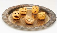 These shrunken heads are a perfect centerpiece for your Halloween party.