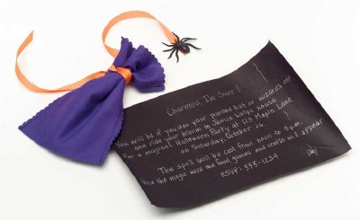 Place invitations into a charm pouch when throwing a Halloween party.