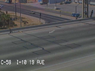 Notice the loop detectors placed in the road. As cars pass over the loops, the detectors are able to detect speed and movement.