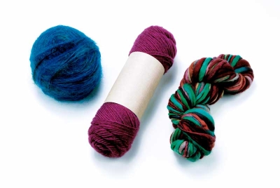 Your journey into the world of knitting begins with needles and some yarn.