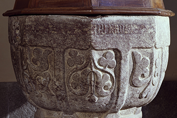This 16th-century baptismal font features three-leaf clovers, which Christians use to symbolize the trinity of the Father, Son and Holy Ghost.
