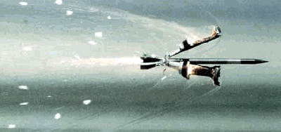 The sabot separates from the penetrator as a sabot round flies through the air.