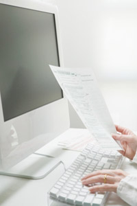 Woman working on computer.