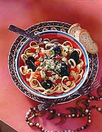 Mussels in Beer Broth Over Pasta Mussels in Beer Broth Over Pasta