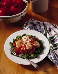 Scallops and Marinara Sauce on Spinach Fettuccine Scallops and Marinara Sauce on Spinach Fettuccine