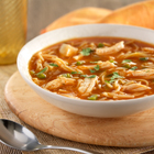 Richly flavored chicken and fideo soup with tomato sauce and poblano and jalapeño peppers Richly flavored chicken and fideo soup with tomato sauce and poblano and jalapeño peppers