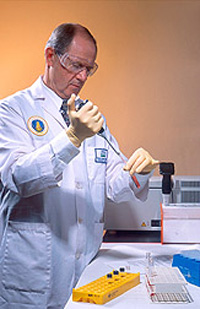 Chemist prepares blood samples for analysis