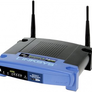 A wireless router uses an antenna to send signals to wireless devices and a wire to send signals to the Internet.